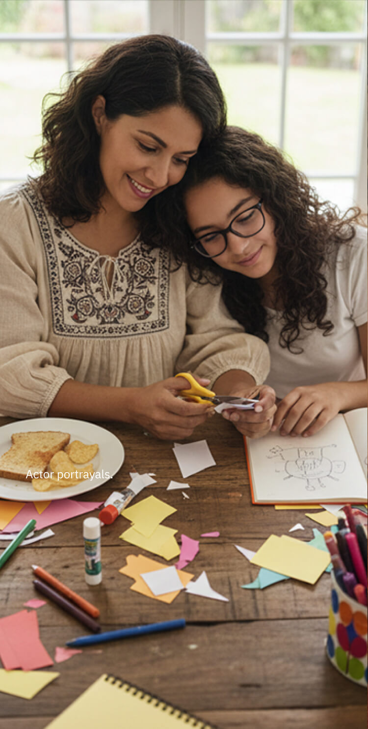 Photo of mother and daughter at table